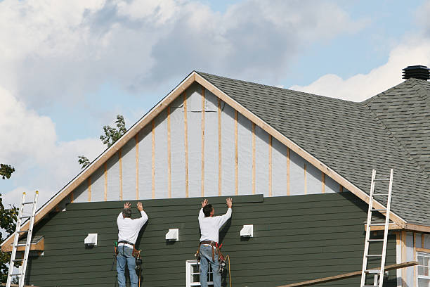 Professional Siding Installation technician working in Warsaw, KY